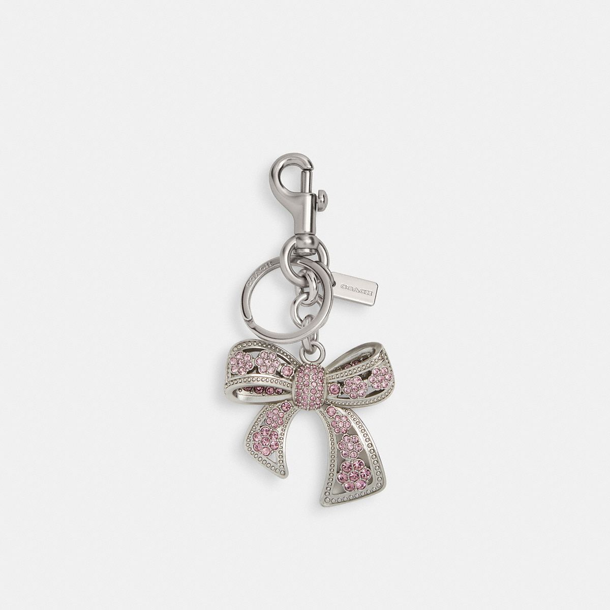 Coach crystal bow bag charm in silver and purple