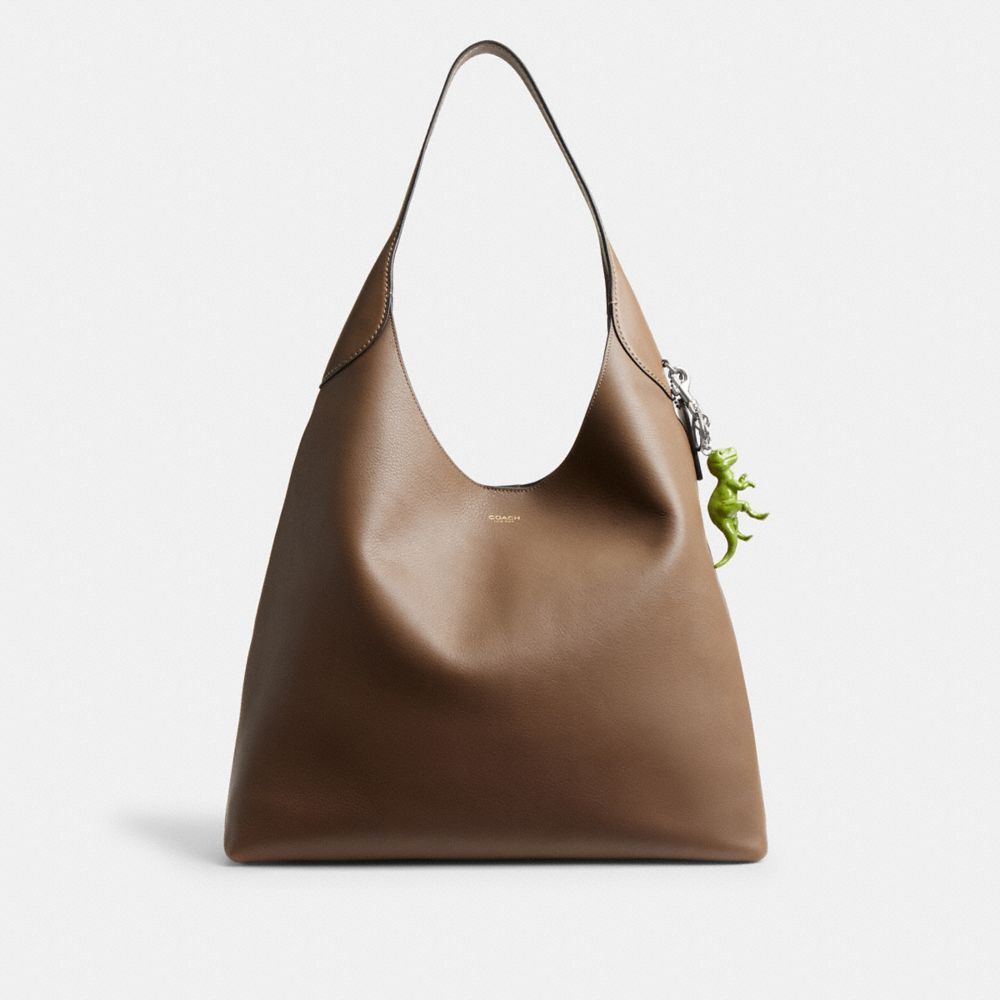 Shop Coach T Rex Bag Charm In Silver/green
