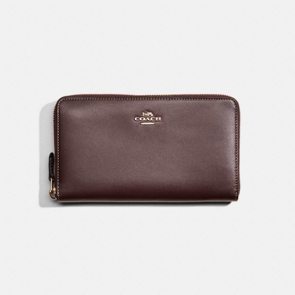 Shop Coach Restored Continental Wallet In Gold/oxblood