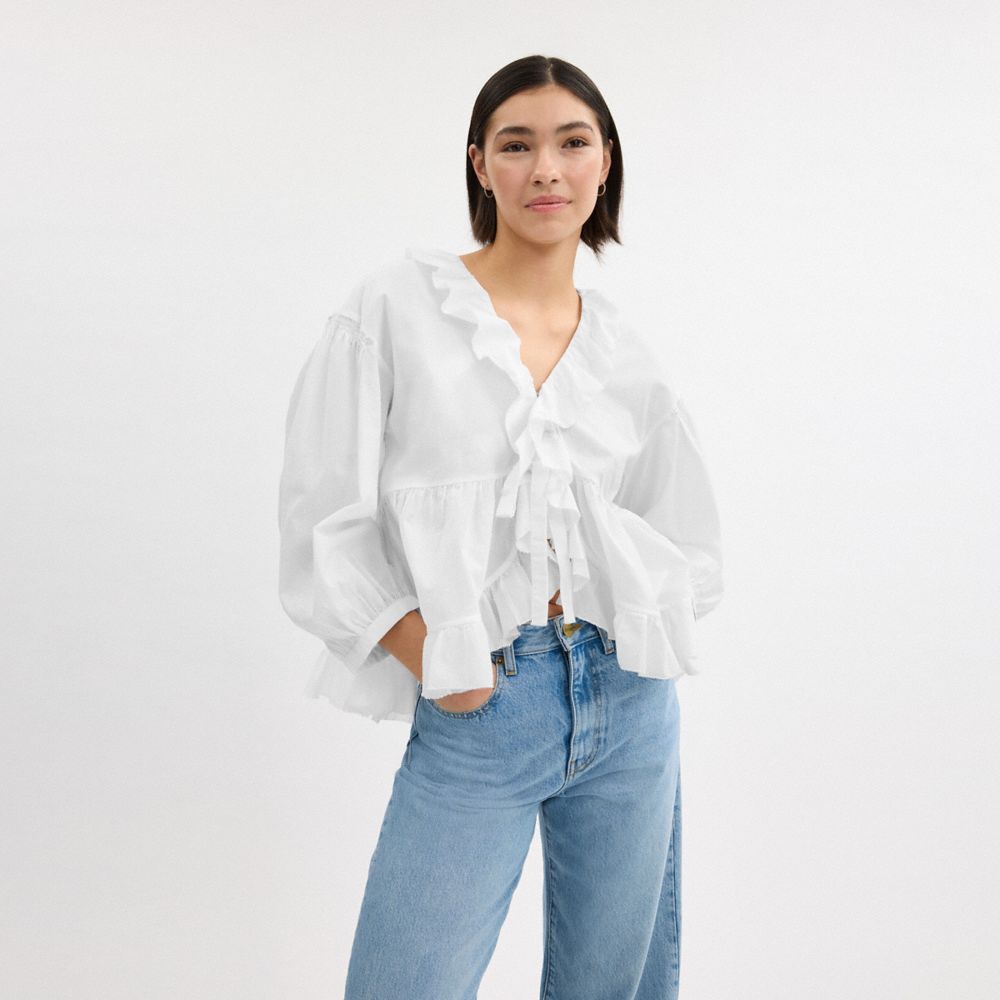 Shop Coach Ruffle Blouse In White