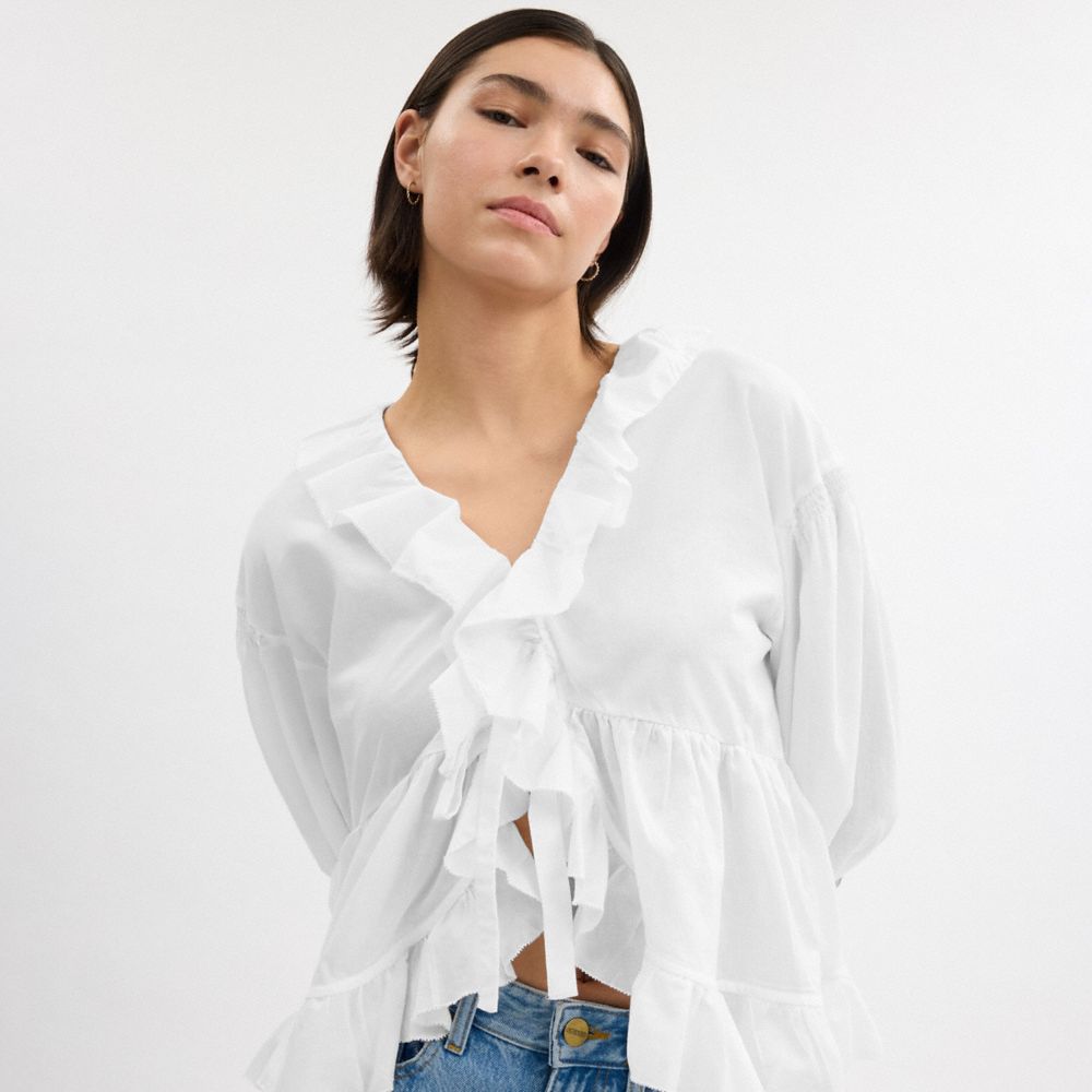 Shop Coach Ruffle Blouse In White