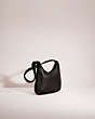 COACH®,VINTAGE ERGO MINI ZIP BAG,Glovetanned Leather,Small,Brass/Black,Angle View