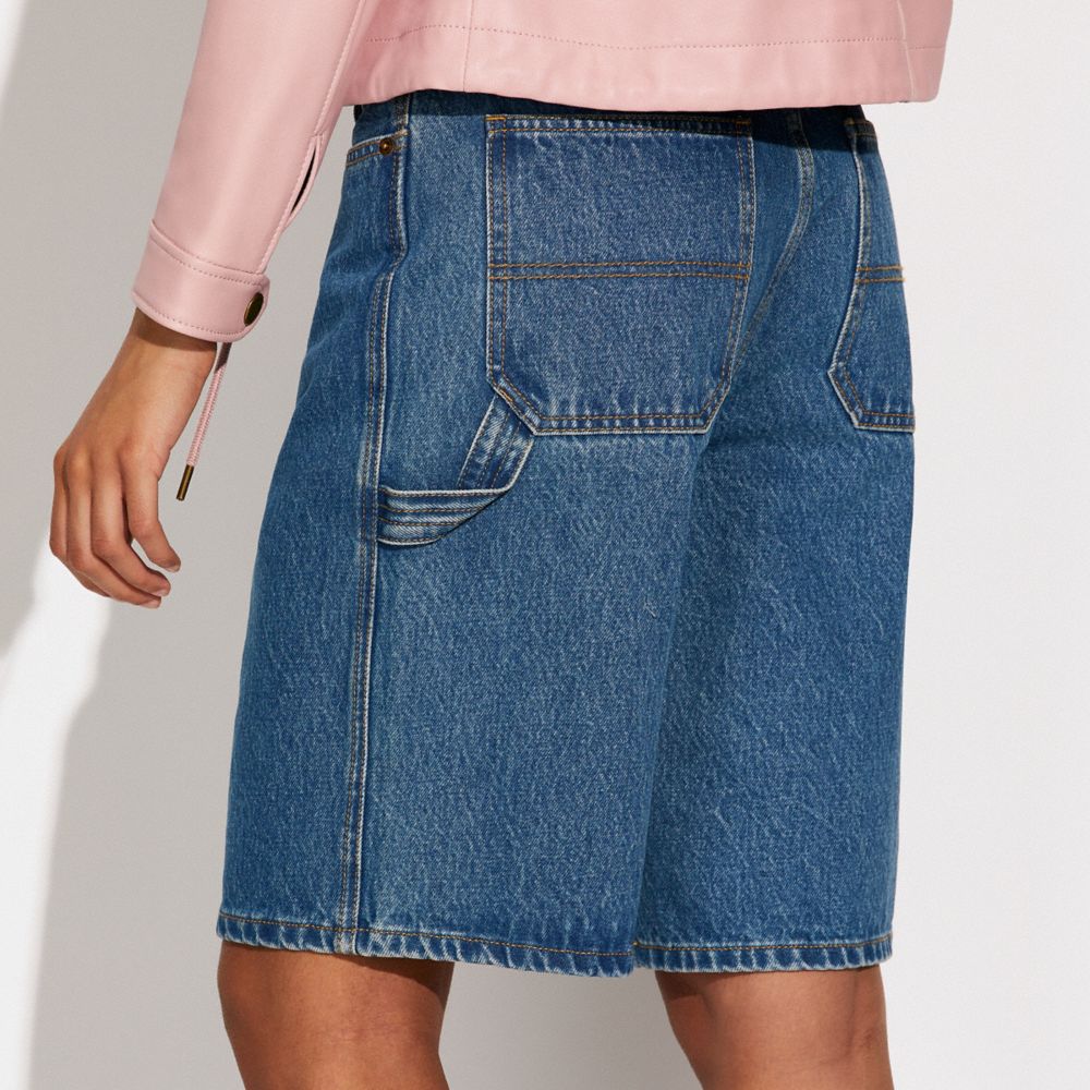 COACH®,SKATER JEAN SHORTS,cotton,Medium Indigo,Detail View