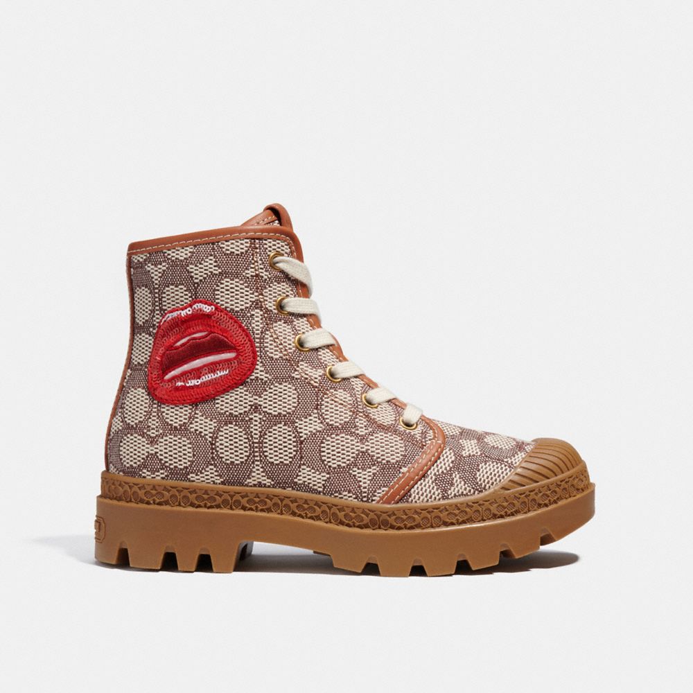 COACH®,COACH X TOM WESSELMANN TROOPER MID TOP BOOT IN SIGNATURE JACQUARD,Burnished Amber/Coca,Angle View