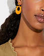 COACH®,LARGE SIGNATURE ENAMEL EARRINGS,Brass,Orange/Gold,Detail View