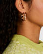 COACH®,LARGE SIGNATURE ENAMEL HOOP EARRINGS,Plated Brass,Gold/Orange Multi,Detail View