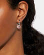COACH®,TURNLOCK HOOP EARRINGS,Brass,Silver/Pink,Detail View