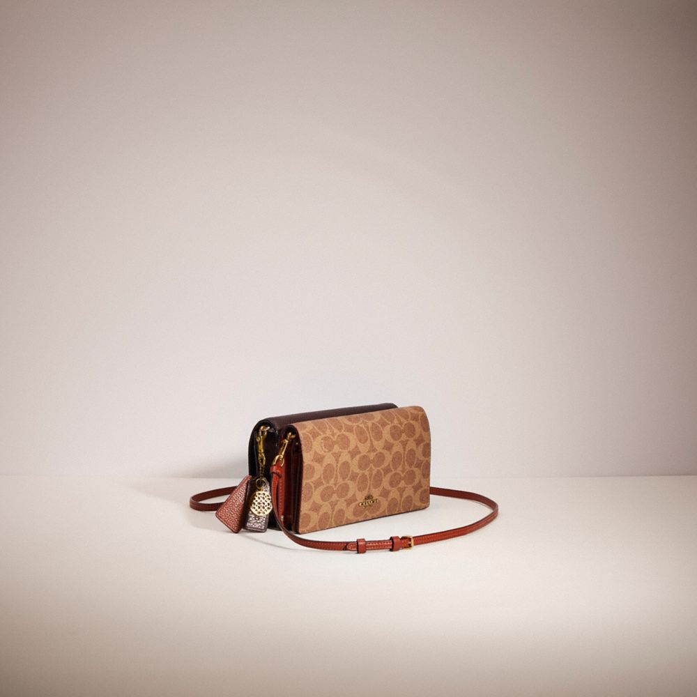 Hayden foldover crossbody clutch in colorblock signature canvas new arrivals