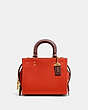 COACH®,ROGUE 17 IN COLORBLOCK,Pebble Leather,Mini,Brass/Red Orange Multi,Front View