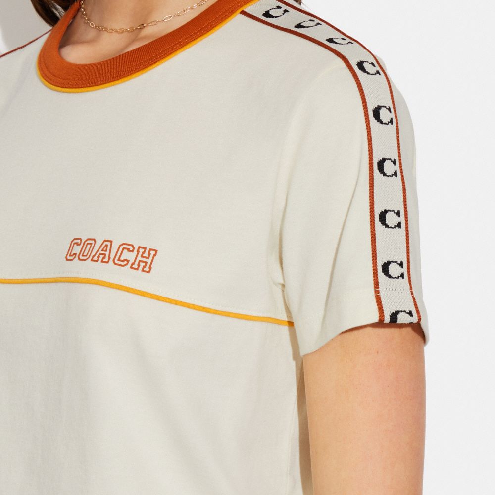 公式】コーチアウトレット | ヴァーシティ コーチ Tシャツ