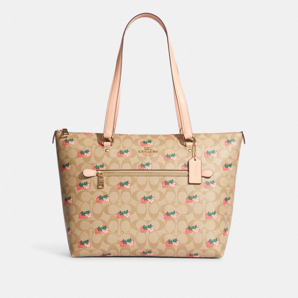 COACH®,GALLERY TOTE IN SIGNATURE CANVAS WITH STRAWBERRY PRINT,X-Large,Gold/Light Khaki Multi,Front View