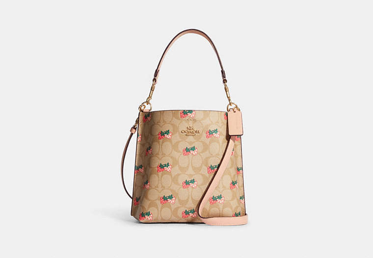 COACH®,MOLLIE BUCKET BAG 22 IN SIGNATURE CANVAS WITH STRAWBERRY PRINT,Medium,Gold/Light Khaki Multi,Front View