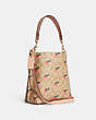 COACH®,MOLLIE BUCKET BAG 22 IN SIGNATURE CANVAS WITH STRAWBERRY PRINT,Medium,Gold/Light Khaki Multi,Angle View