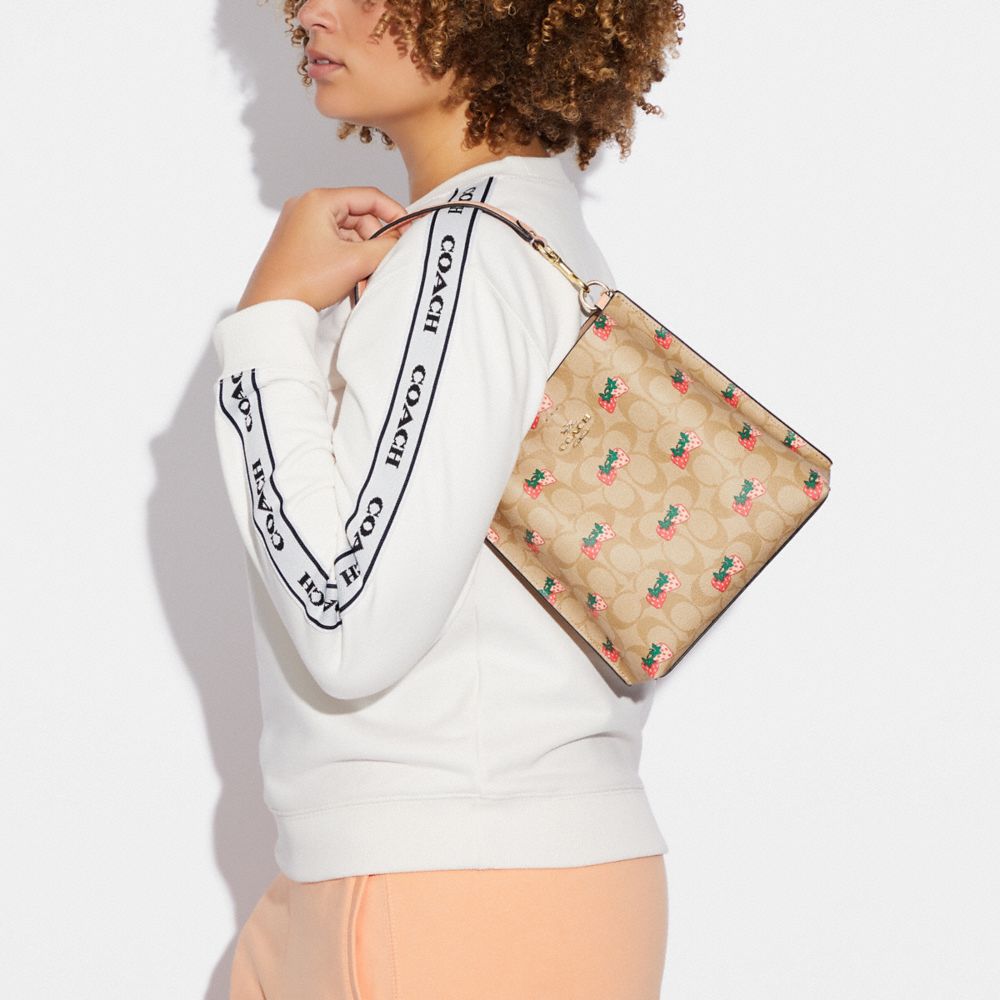 COACH®,Mollie Bucket Bag 22 In Signature Canvas With Strawberry Print,,Detail View