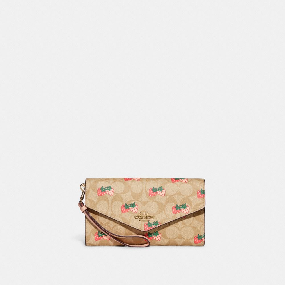 COACH Travel Envelope Wallet In Signature Canvas With Strawberry Print