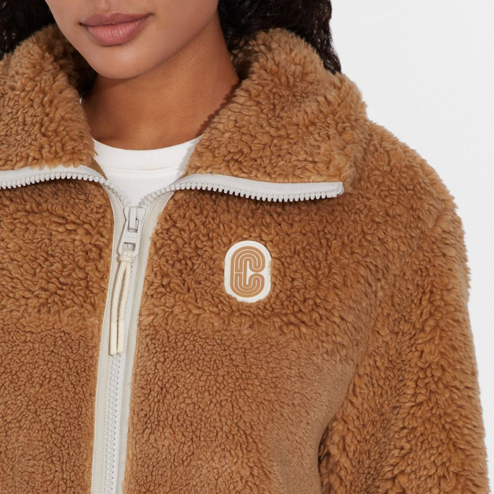 Coach solid sherpa zip up jacket sale