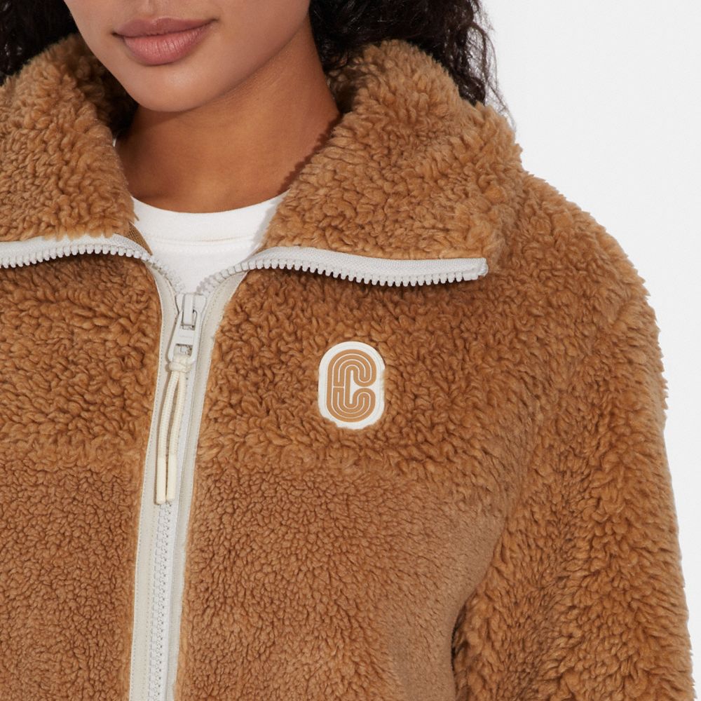 COACH OUTLET®  Signature Sherpa Zip Up Jacket