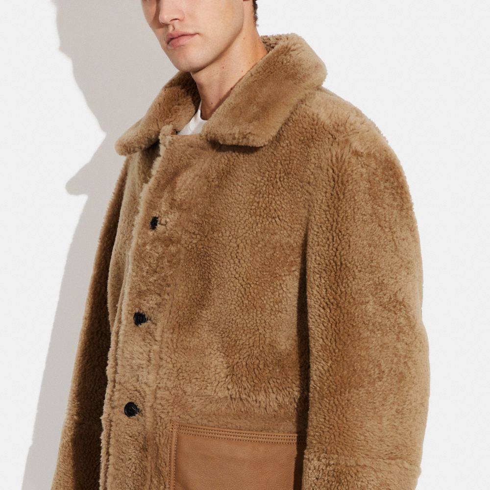 COACH®: Reversible Shearling Hoodie