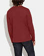 COACH®,ESSENTIAL LONG SLEEVE T-SHIRT IN ORGANIC COTTON,Organic Cotton,Oxblood,Scale View