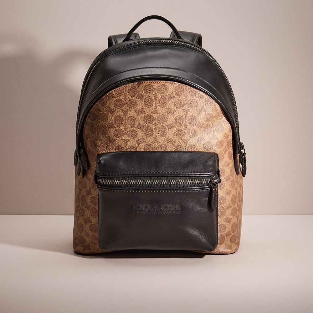 COACH®,RESTORED CHARTER BACKPACK IN SIGNATURE CANVAS,Signature Coated Canvas,X-Large,Black Copper/Tan,Front View