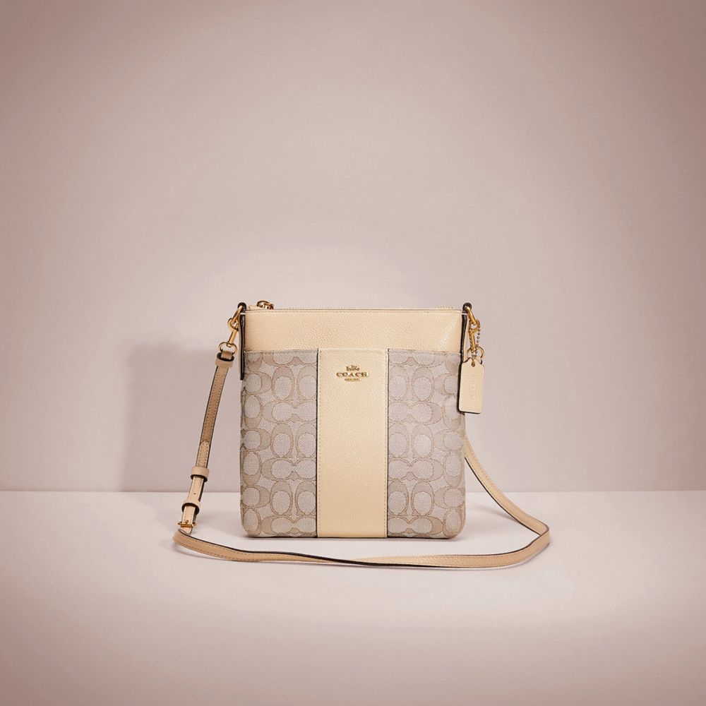 Kitt messenger crossbody in clearance signature jacquard