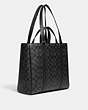COACH®,HUDSON DOUBLE HANDLE TOTE IN SIGNATURE CANVAS,Signature Coated Canvas,Large,Gunmetal/Charcoal/Black,Angle View
