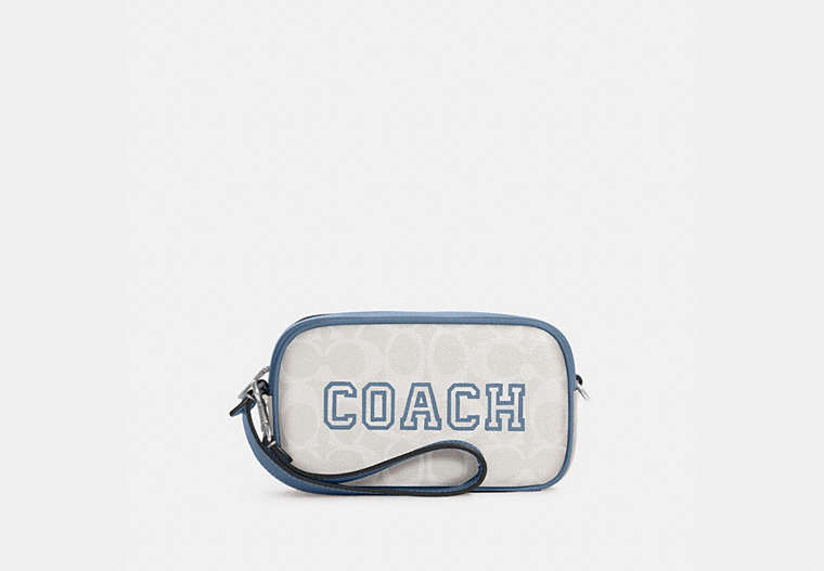 COACH®,JAMIE WRISTLET IN SIGNATURE CANVAS WITH VARSITY MOTIF,Signature Coated Canvas,Small,Silver/Chalk/Indigo,Front View