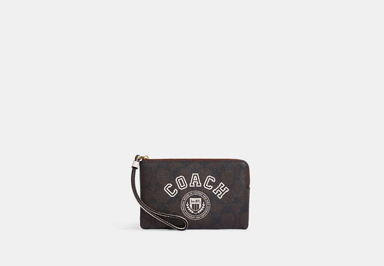 COACH®,CORNER ZIP WRISTLET IN SIGNATURE CANVAS WITH VARSITY MOTIF,Signature Coated Canvas,Mini,Im/Brown/Chalk Multi,Front View