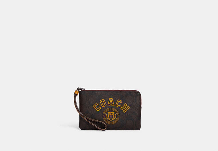 COACH®,CORNER ZIP WRISTLET IN SIGNATURE CANVAS WITH VARSITY MOTIF,Signature Coated Canvas,Mini,Black Antique Nickel/Brown/Buttercup,Front View
