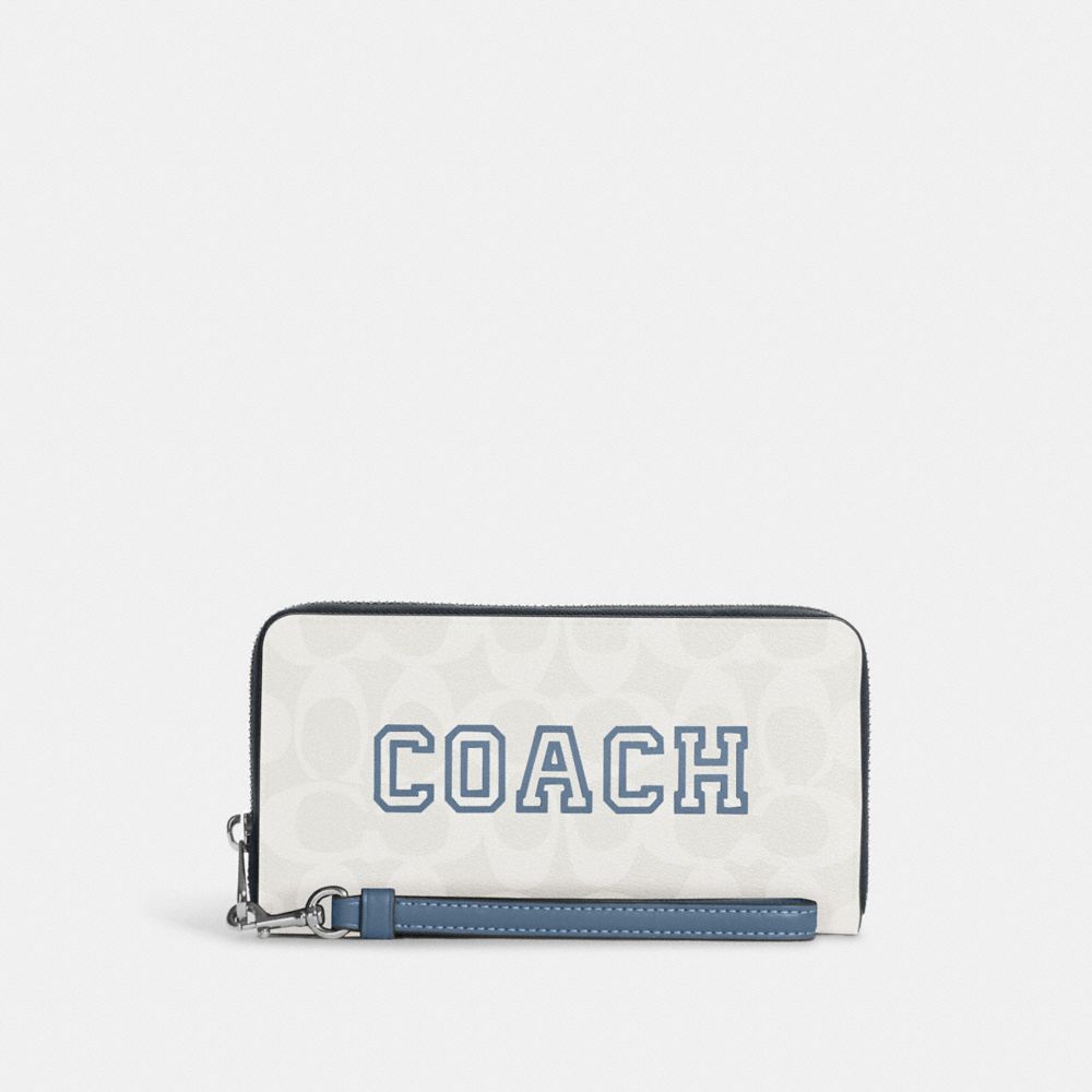 COACH® | Long Zip Around Wallet In Signature Canvas With Varsity Motif