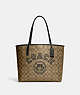 COACH®,CITY TOTE IN SIGNATURE CANVAS WITH VARSITY MOTIF,Signature Coated Canvas,Large,Gold/Khaki/Amazon Green,Front View