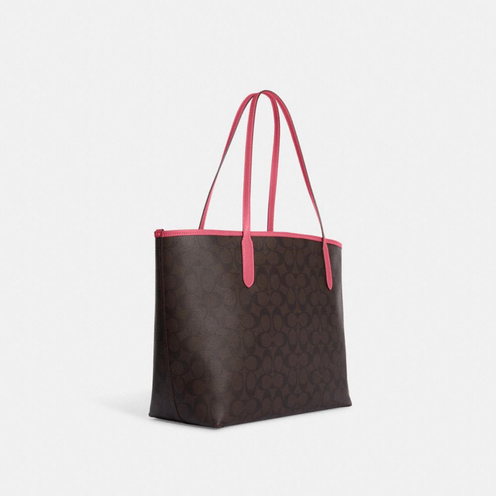 COACH®,CITY TOTE BAG IN SIGNATURE CANVAS WITH VARSITY MOTIF,Large,Im/Brown/Watermelon,Angle View
