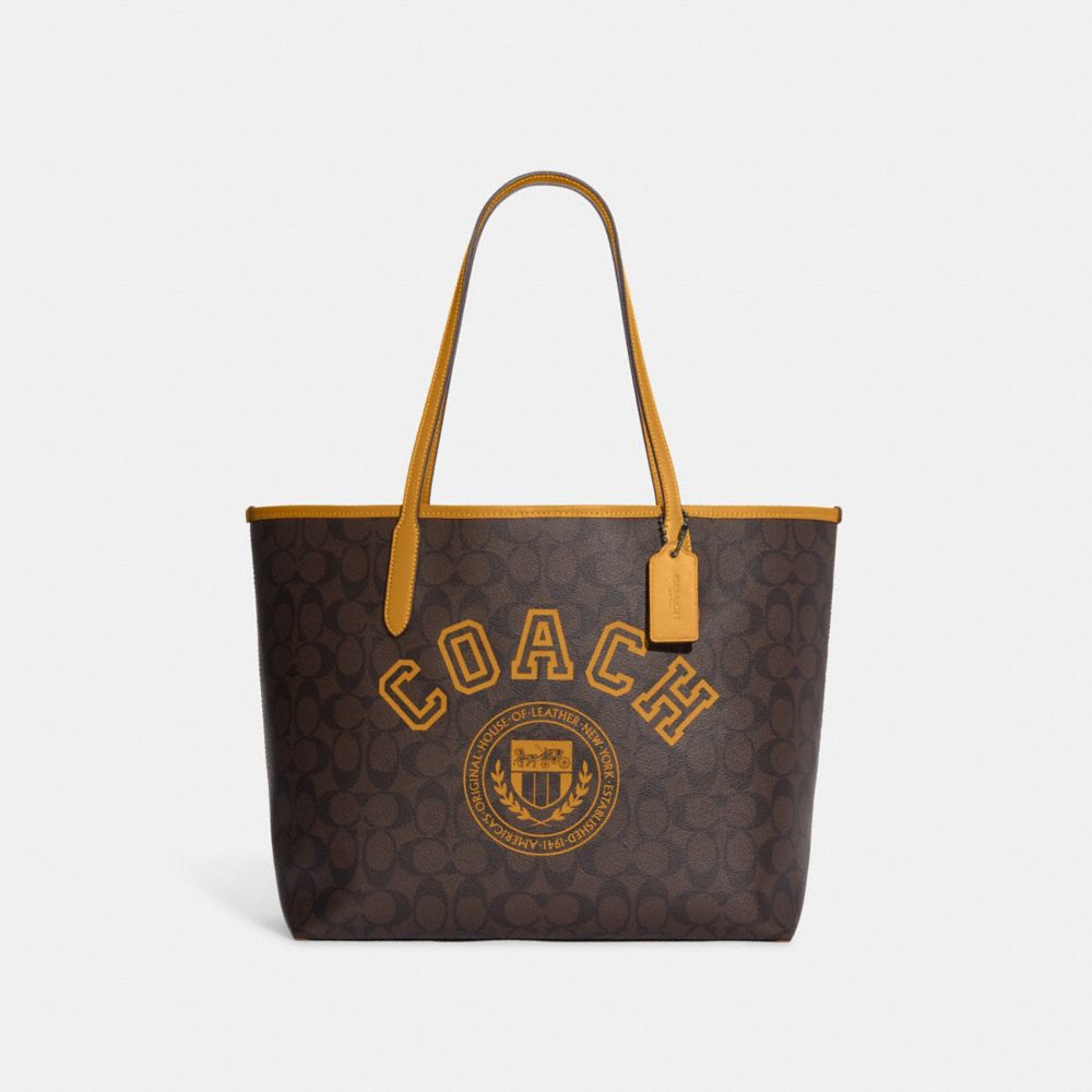 COACH®,CITY TOTE BAG IN SIGNATURE CANVAS WITH VARSITY MOTIF,Large,Black Antique Nickel/Brown/Buttercup,Front View