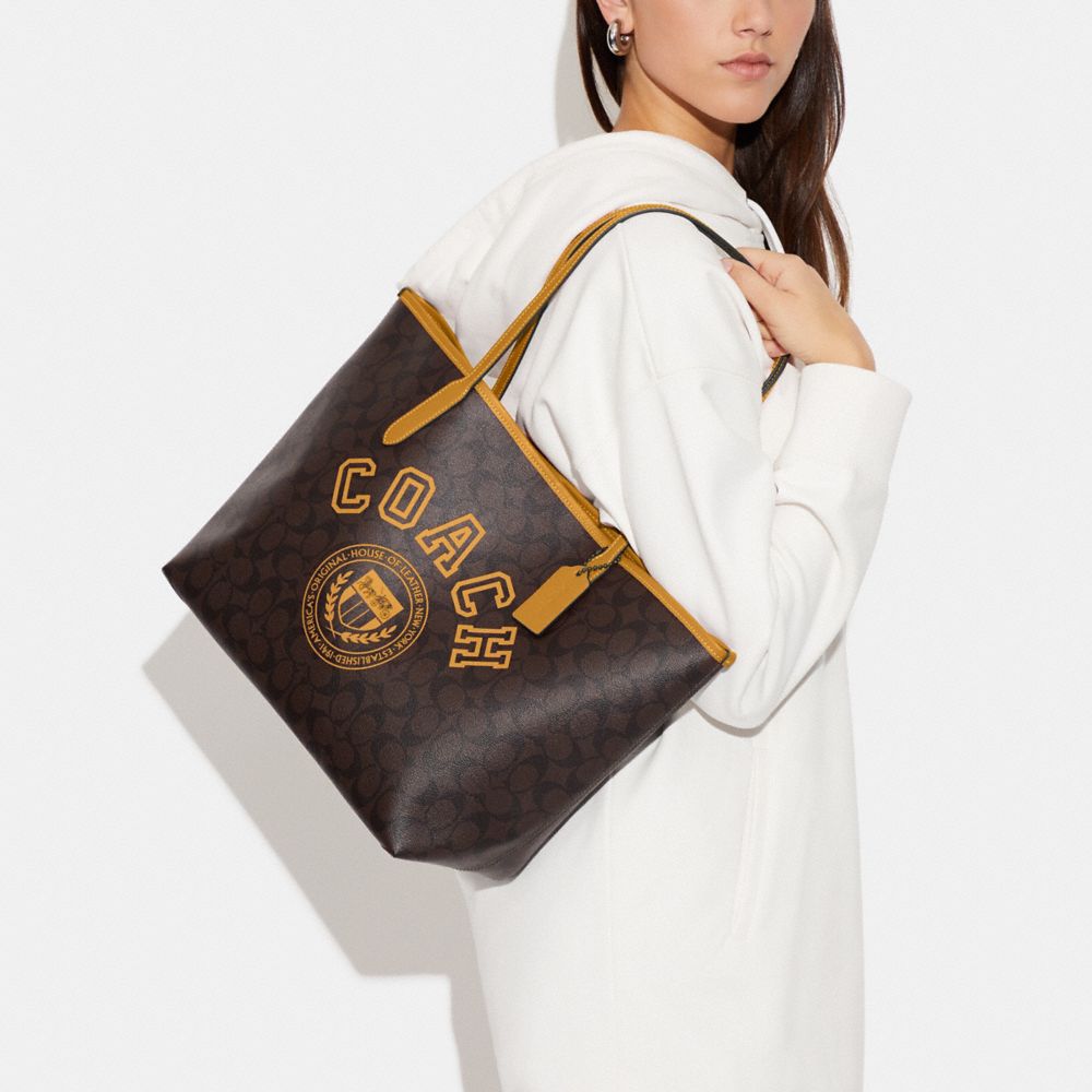 COACH®,City Tote Bag In Signature Canvas With Varsity Motif,,Detail View