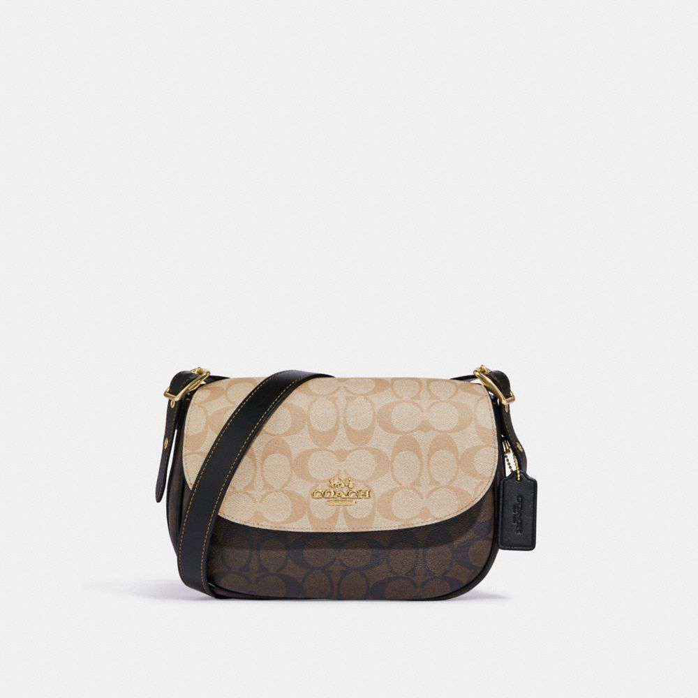 Ellen crossbody discount in signature canvas