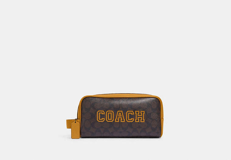 COACH®,LARGE TRAVEL KIT IN SIGNATURE CANVAS WITH VARSITY MOTIF,Medium,Black Antique Nickel/Mahogany/Buttercup,Front View