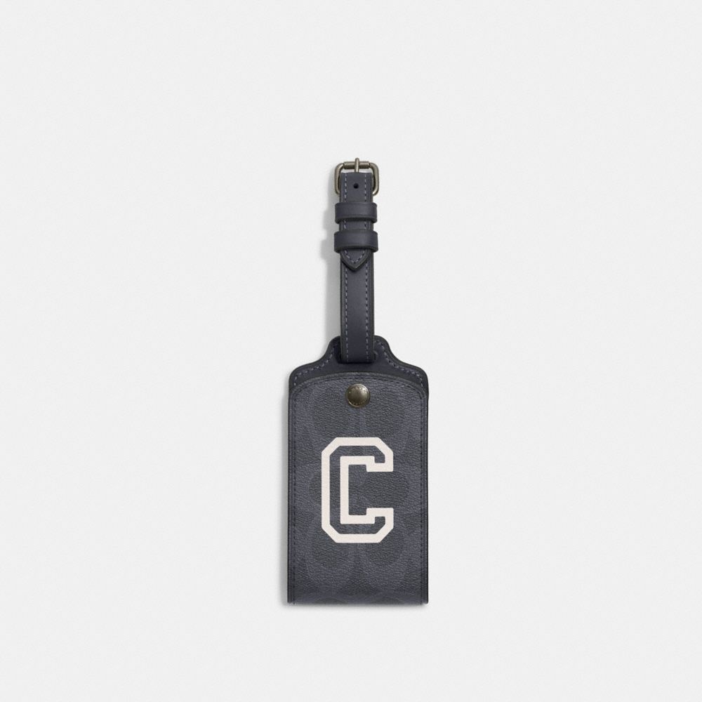 COACH Luggage Tag In Signature Canvas With Varsity Motif