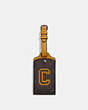 COACH®,LUGGAGE TAG IN SIGNATURE CANVAS WITH VARSITY MOTIF,Signature Coated Canvas,Black Antique Nickel/Mahogany/Buttercup,Front View