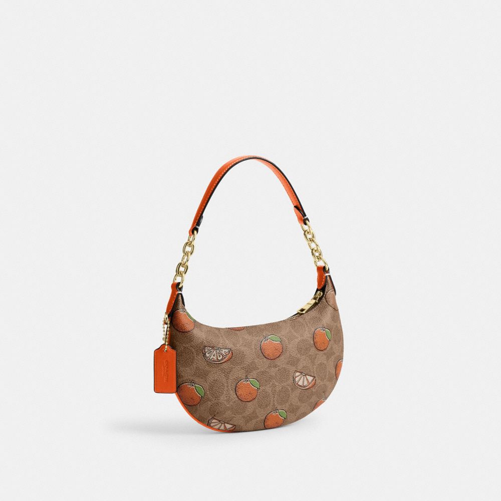 COACH®,Mini Payton Bag In Signature Canvas With Orange Print,,Angle View