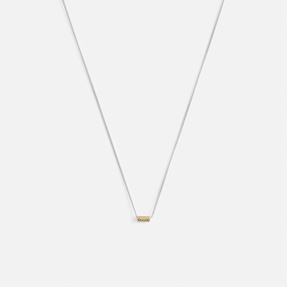 Shop Coach Quilted Signature Bead Pendant Necklace In Gold/silver