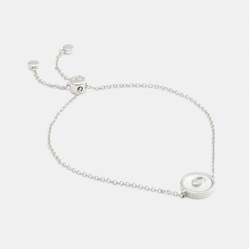 COACH MOTHER OF PEARL SIGNATURE COIN SLIDER BRACELET 