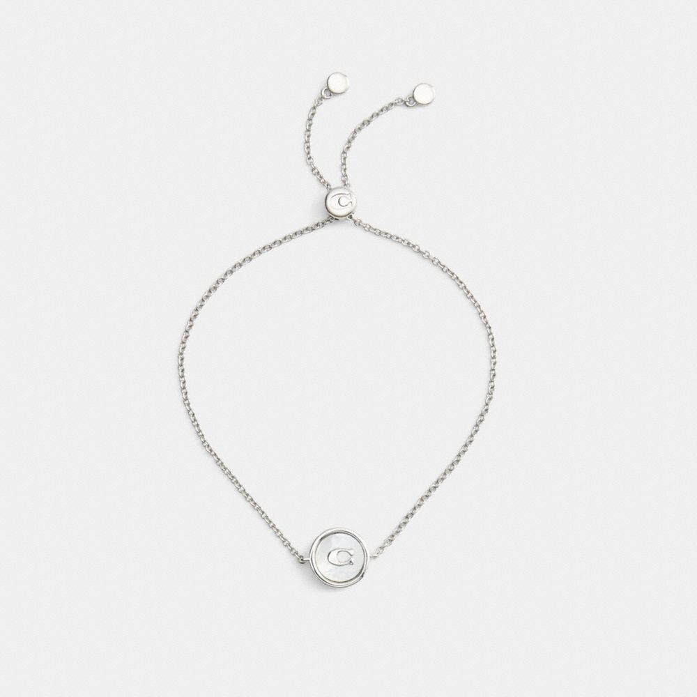COACH MOTHER OF PEARL SIGNATURE COIN SLIDER BRACELET 