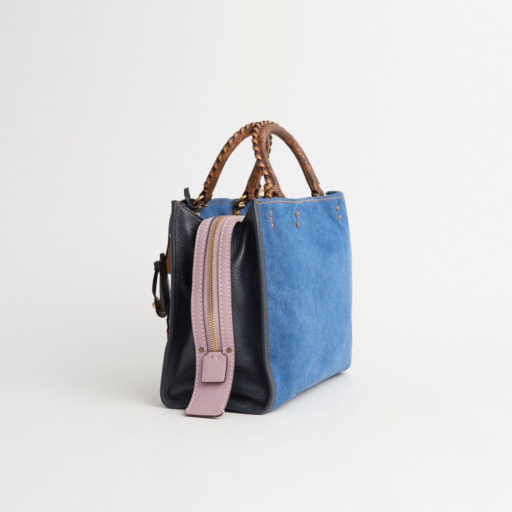 COACH®,Restored Rogue Bag With Patchwork And Snakeskin Handles,,Angle View