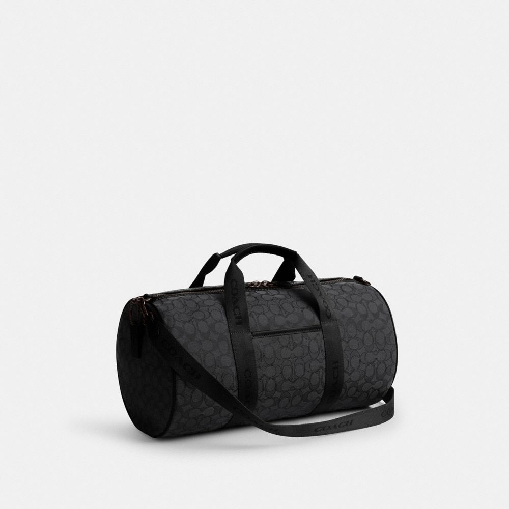 COACH®,Theo Duffle In Signature Jacquard,,Angle View