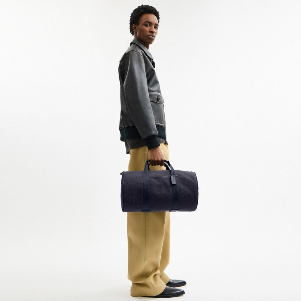 COACH®,Theo Duffle In Signature Jacquard,,Detail View