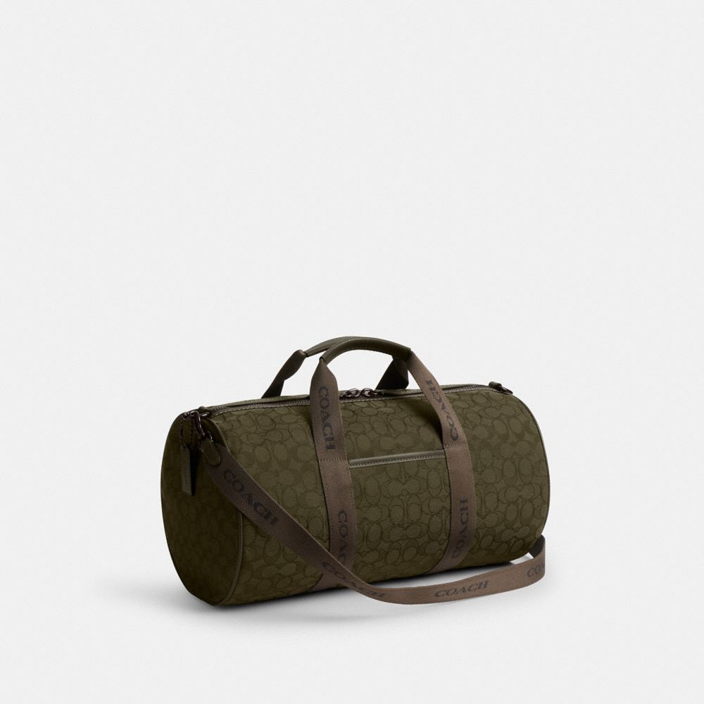 COACH®,Theo Duffle In Signature Jacquard,,Angle View