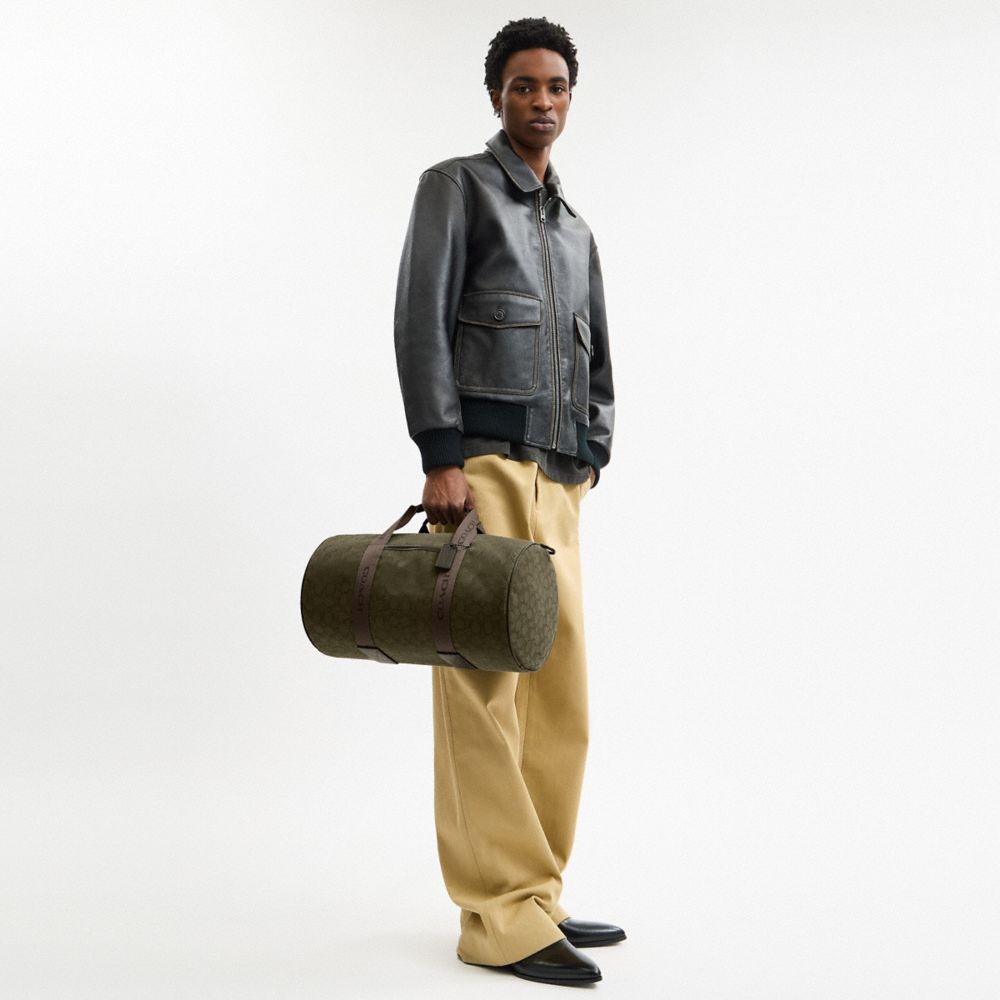 COACH®,Theo Duffle In Signature Jacquard,,Detail View