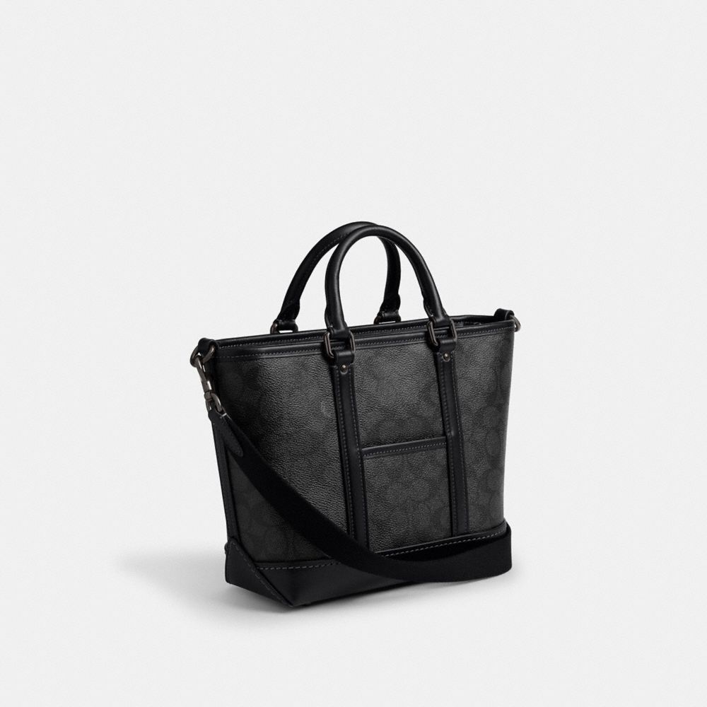 COACH®,Metropolitan Carryall Bag 22 In Signature Canvas,,Angle View