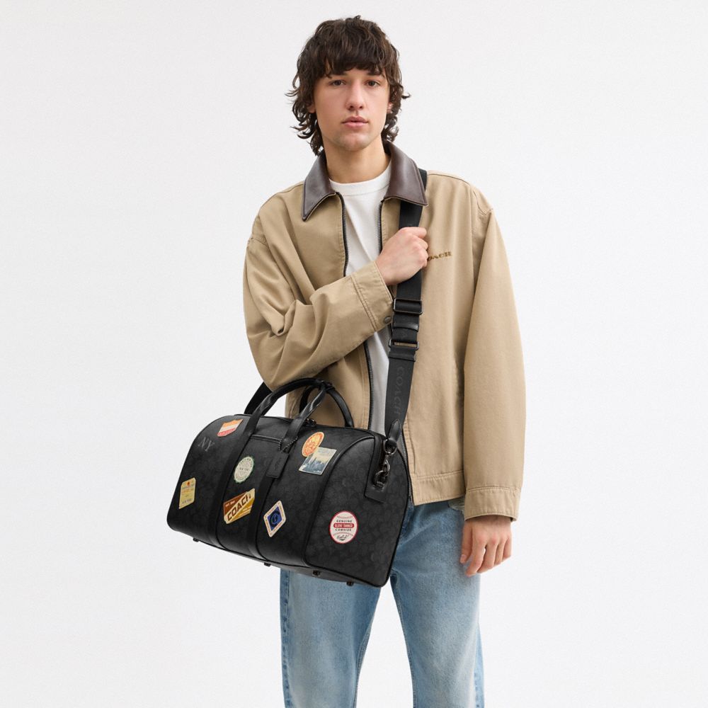 COACH®,Gotham Duffle Bag 45 In Signature Canvas With Patches,,Detail View