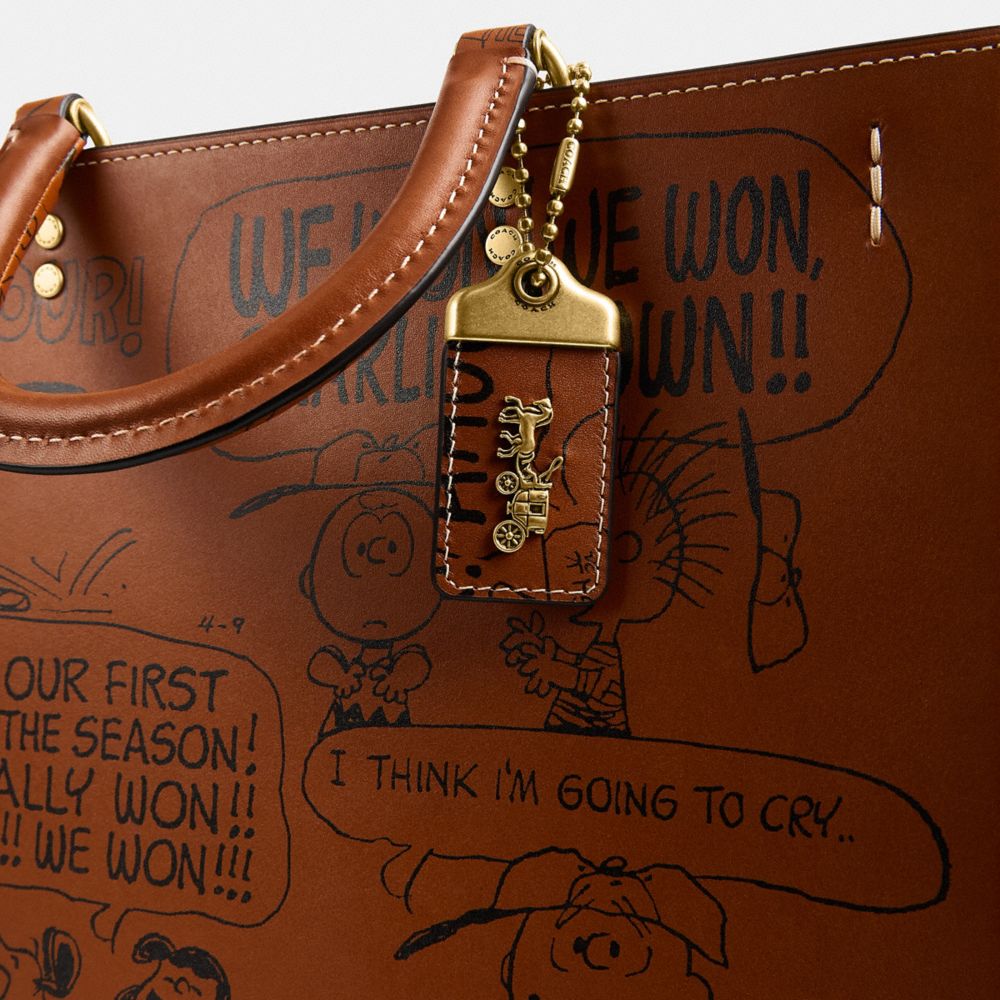 COACH®,Coach X Peanuts Rogue Bag With Newspaper Print,,Closer View